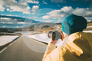 Aurlandsfjellet, Norway. Young Happy Woman Tourist Traveler Photographer Taking Pictures Photos Of Aurlandsfjellet