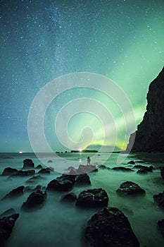 Aurora borealis above Vik rock formation Iceland