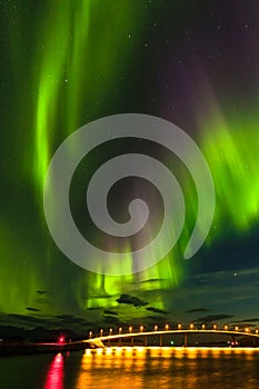 Aurora borealis, dramatic polar lights over the mountains in the North of Europe - Lofoten islands, Norway