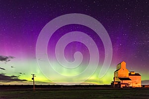 Aurora Borealis Northern Lights over Grain Elevator in Pennant, Saskatchewan