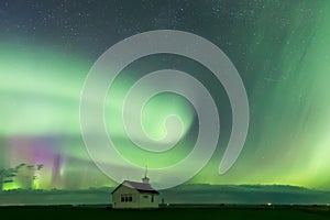 Aurora Borealis Northern Lights over Historical School near Kyle, Saskatchewan, Canada