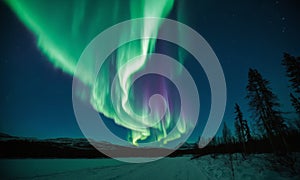 Aurora borealis, northern lights over mountains in winter, Iceland