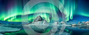 Aurora borealis on the Norway. Green northern lights above mountains. Night sky with polar lights. Night winter landscape