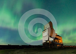 Aurora Borealis over a grain elevator in Saskatchewan, Canada