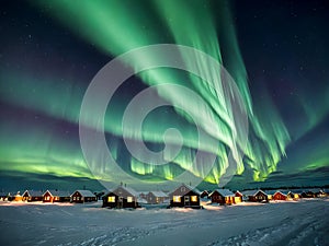 Aurora borealis over houses in winter