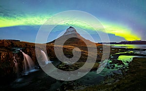 Aurora Borealis over Kirkjufell mountain in iceland