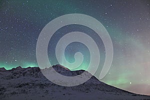 Aurora Borealis over a mountain