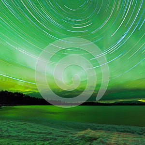 Aurora borealis startrails frozen Lake Laberge