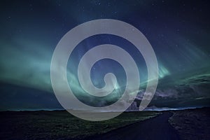 Aurora over Icelandic Lava Field Road