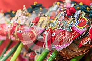 Auspicious rake ornated with Japanese folklore lucky charms of Ebisu god of fishing.