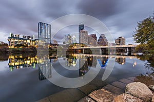 Austin downtown skyline by the river at night, Texas