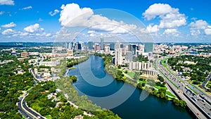 Austin Texas aerial drone view green landscape summer puffy clouds panoramic panorama