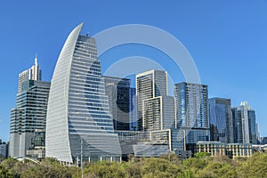 Austin Texas city skyline showing modern buildings and vibrant blue sky