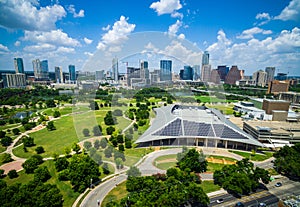 Austin Texas Powered by Solar Panels on Rooftop of Large building Downtown Skyline Cityscape photo