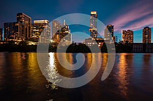 Austin Texas skyline cityscape downtown. USA Austin city. Night sunset city. Reflection in water.