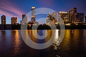 Austin Texas skyline cityscape downtown. USA Austin city. Night sunset city. Reflection in water.