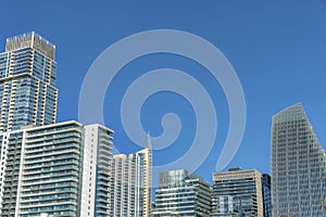 Austin Texas skyline with luxury apartments facade against blue sky background