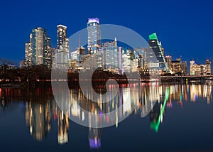 Austin Texas skyline seen at night with modern buildings.