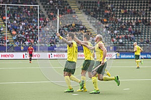 Australia beats Spain during the World Cup Hockey 2014