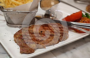 australia beef steak with tomato and frenchfried