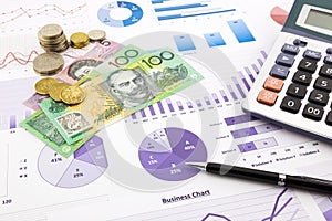 Australia currency on graphs, financial planning and expense rep