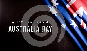 Australia day concept. Australian flag against dark stone background. 26 January