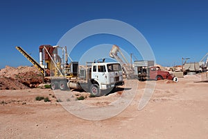 AUSTRALIA, SOUTH AUSTRALIA, COOBER PEDY, AUGUST 11, 2016: Classic mining trucks at a mining in Coober Pedy, Australia.