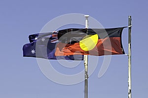 Australian and Aboriginal flags flying together with Union Jack