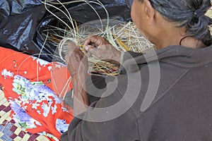 Australian Aboriginal woman basket weaving Northern Territory Australia