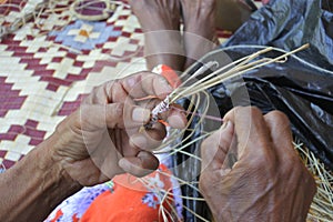 Australian Aboriginal woman basket weaving Northern Territory Australia photo