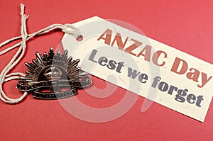 Australian ANZAC Day WW1 Rising Sun Hat Badge with Lest We Forget message