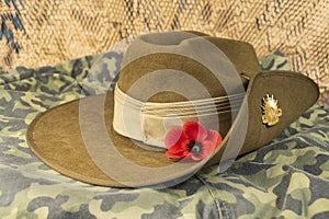 Australian army diggers slouch hat with red poppy.