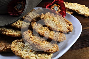 Australian army slouch hat and traditional Anzac biscuits close up photo