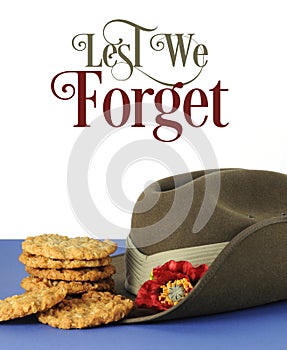 Australian army slouch hat and traditional Anzac biscuits with Lest We Forget text