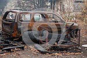 Australian bushfire aftermath: Burnt car and rubble