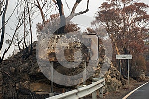 Australian bushfires: burnt road sign