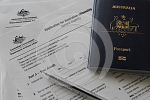 Australian Citizenship application with Australian passport in the foreground