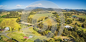 Australian countryside - meadows, pastures, and hills aerial pan