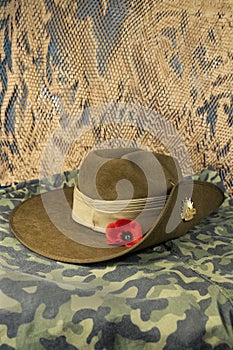 Australian diggers slouch hat on a camouflage background.
