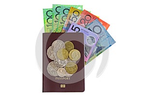 Australian dollar banknote AUD and coins on Passport isolated