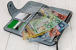 Australian dollars with credit cards in wallet