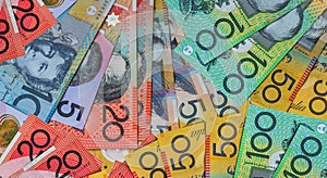 Australian dollars in fan on wooden table, closeup