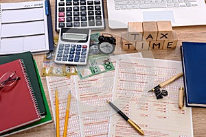 Australian dollars with individual tax form on the desk