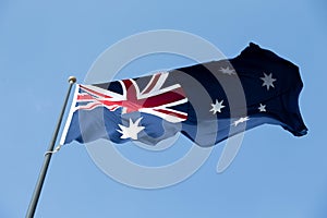 Australian flag against blue sky