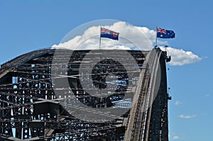 Australian flags flay above Sydney Harbour Bridge