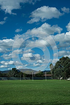 Australian football field with clouds