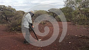 Australian gold prospector searching for gold