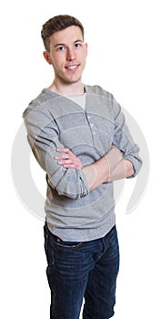 Australian guy in a grey shirt with crossed arms