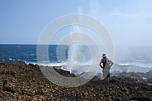 Australian man looking at Carnarvon Blowholes in Western Australia