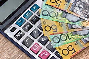 Australian money aud with calculator on desk